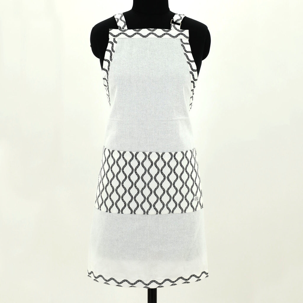 White apron with black steam pattern on a mannequin against a white background