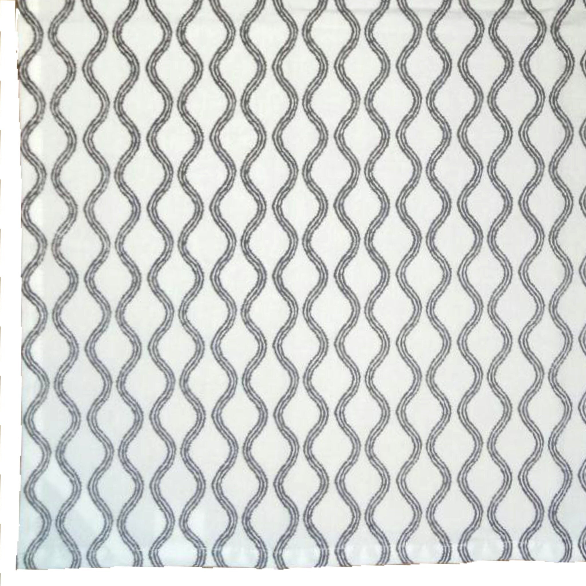 Patterned fabric with wavy lines on a white background
