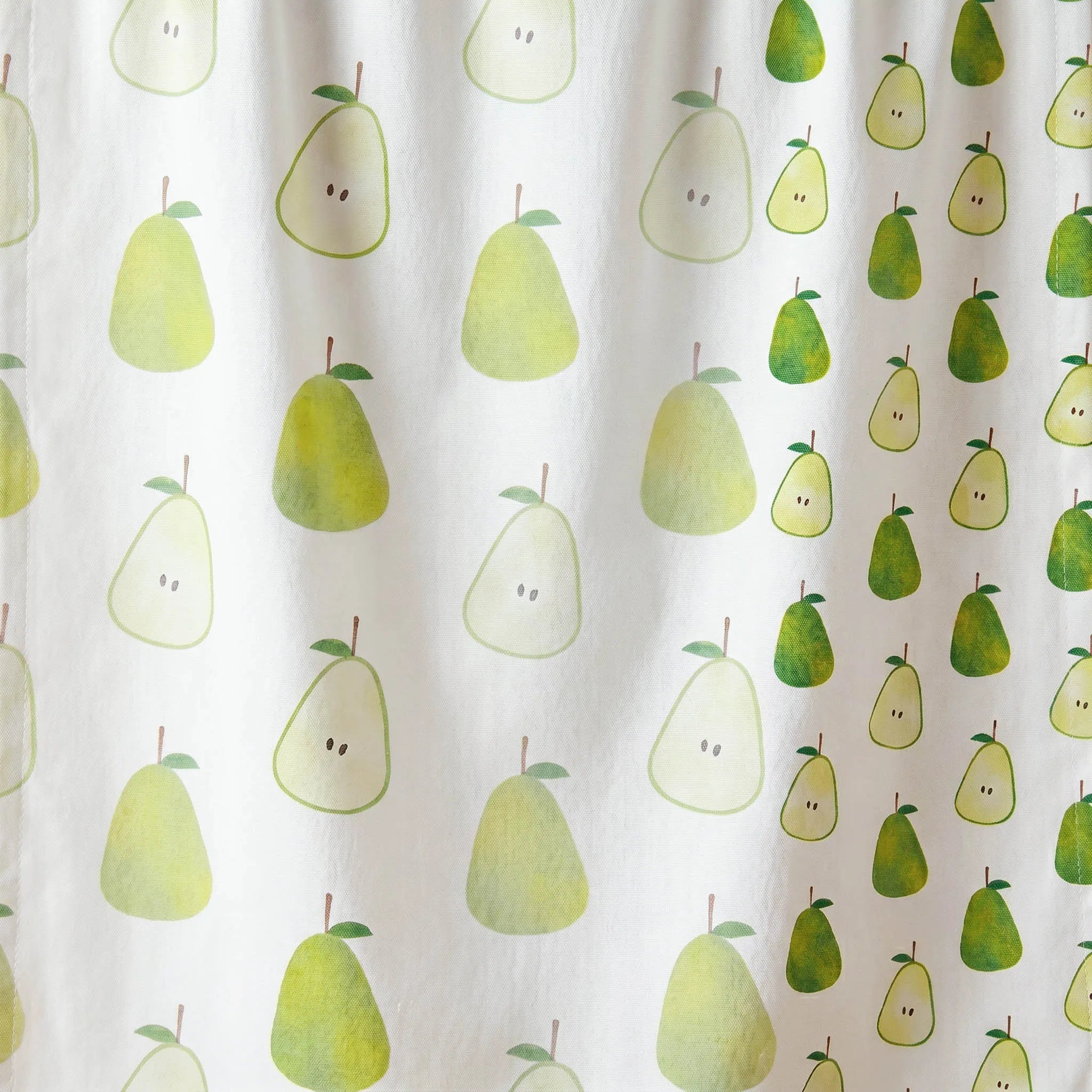 White cotton kitchen towel close up with a repeating pear pattern. from Hem And Tassel