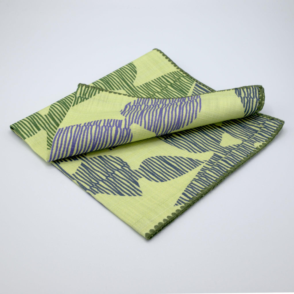 Mint and green Pure Cotton Dinner Napkin 'Celebration' design by Hem And Tassel on a light gray background