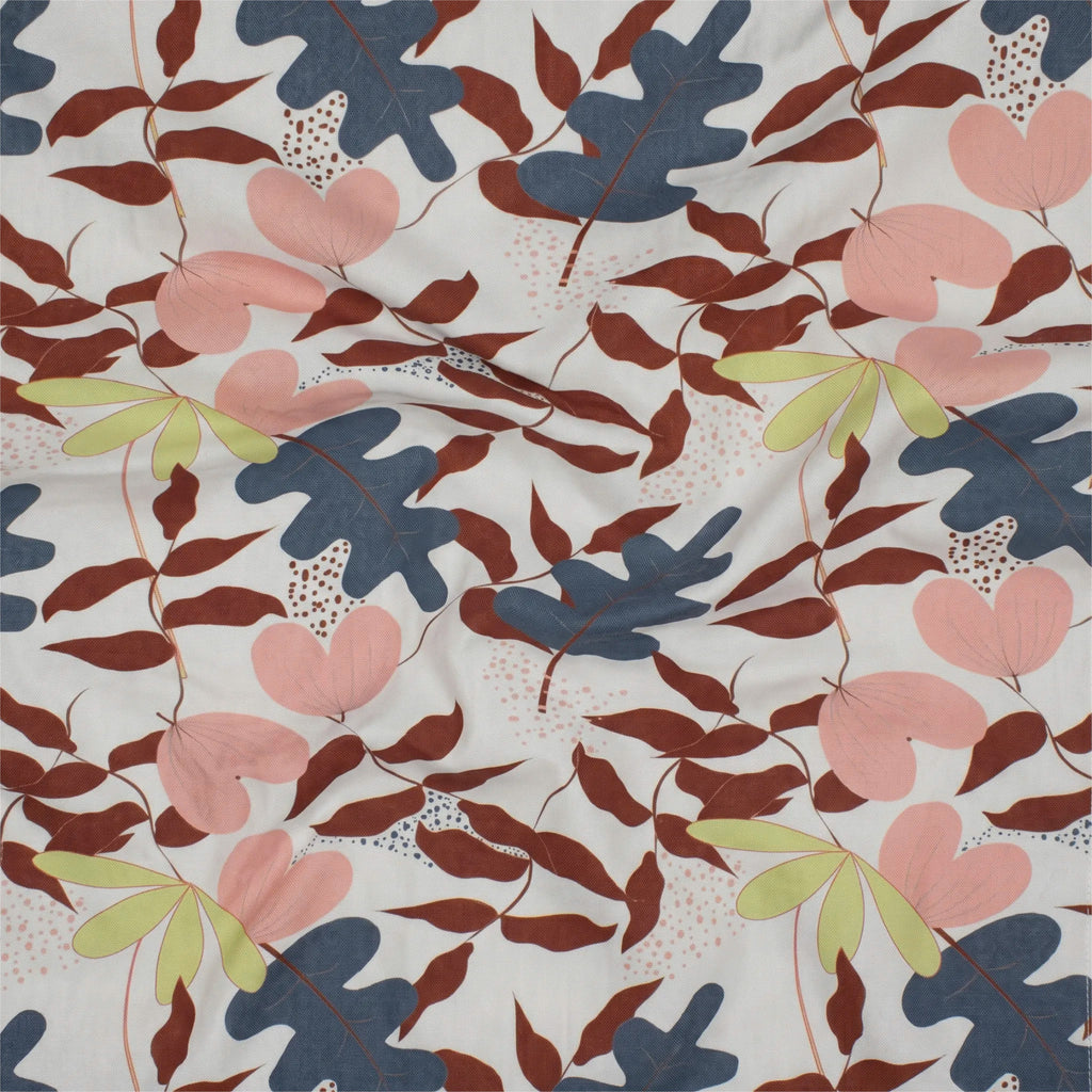 A close-up of a patterned cotton kitchen towel featuring stylized botanical leaves and heart-shaped flowers in dusty pink, slate blue, rust brown, and pale yellow-green on an off-white background.