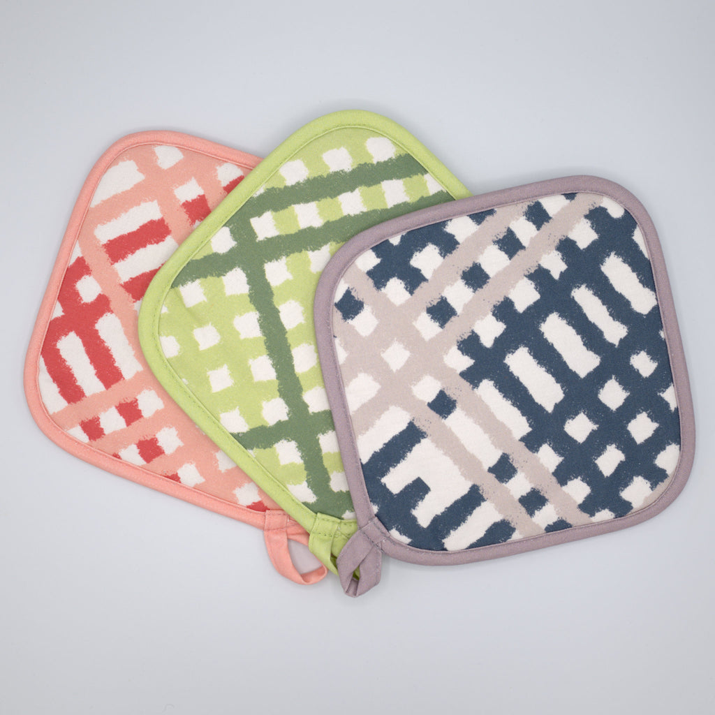 Three jute impossible checked pattern pot holders on a light gray background from Hem And Tassel 