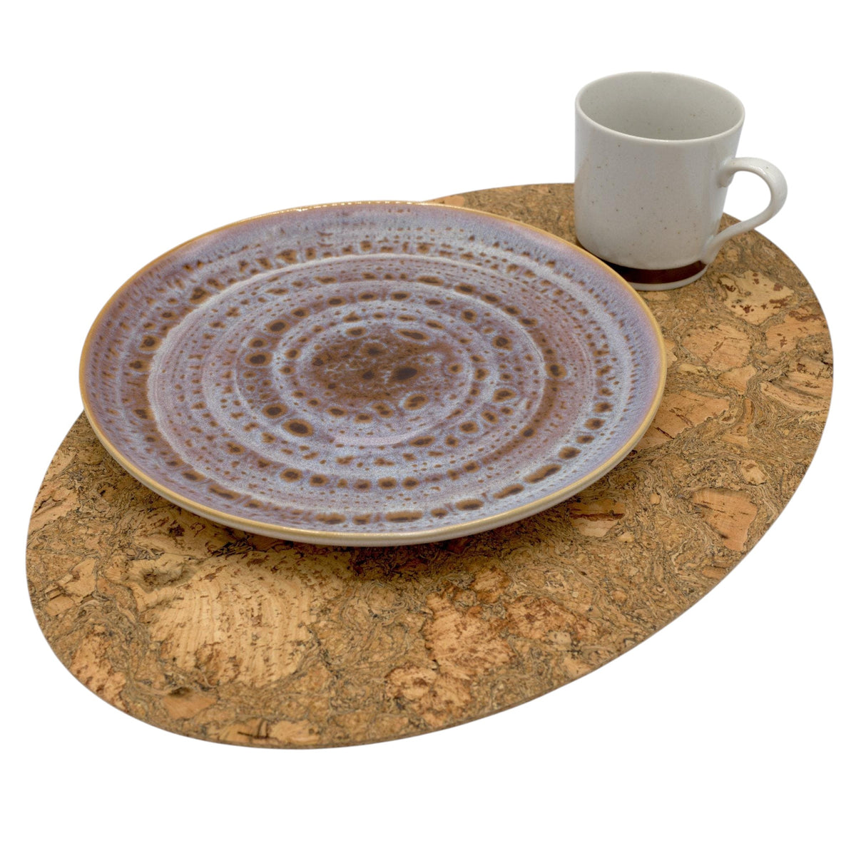 decorative bark peel oval cork placemat with ceramic plate and cup on it - from Hem And Tassel
