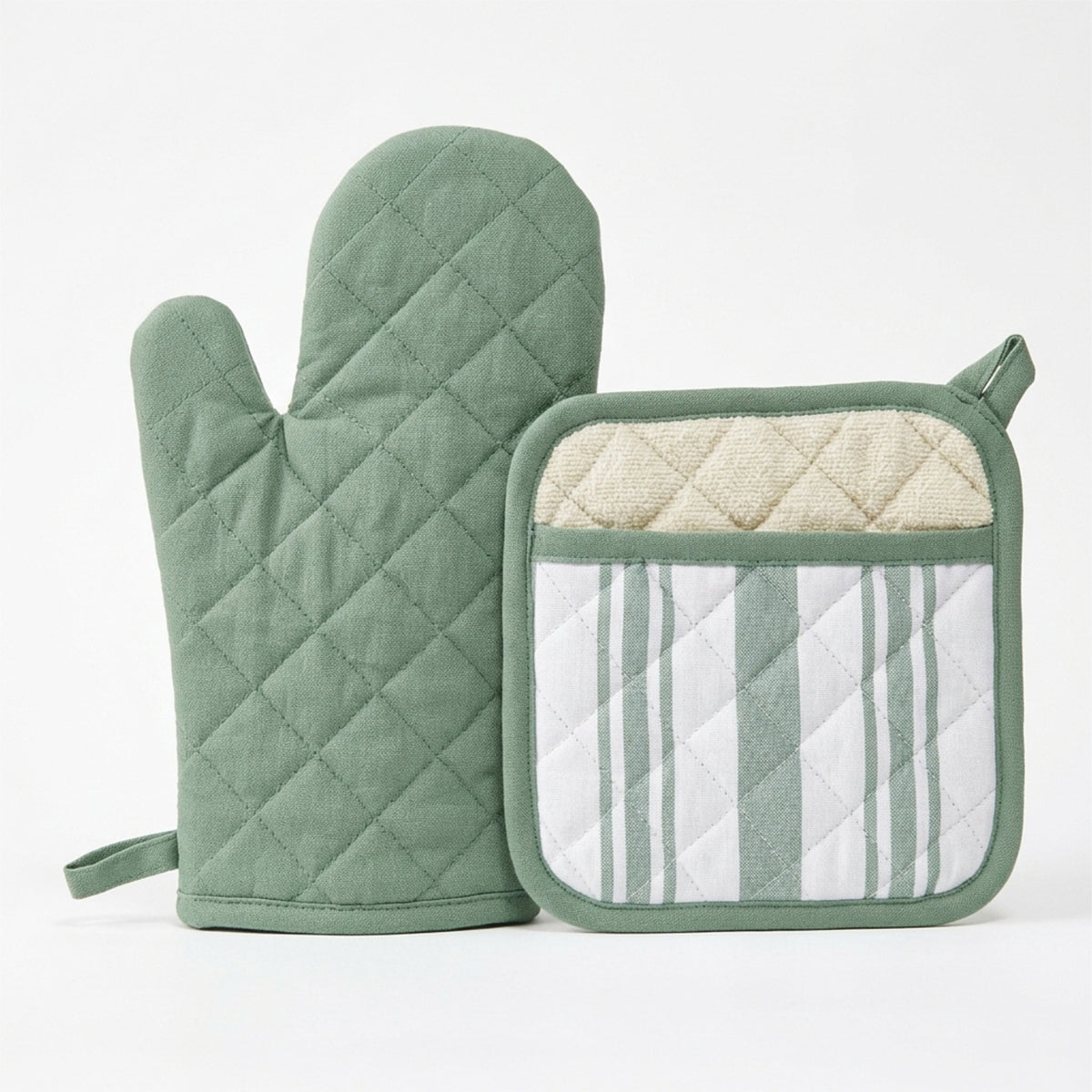 A sage green quilted oven mitt and matching pot holder set on a clean white background. The pot holder features a diamond-quilted section and a pocket with sage green and white vertical stripes from Hem And Tassel 