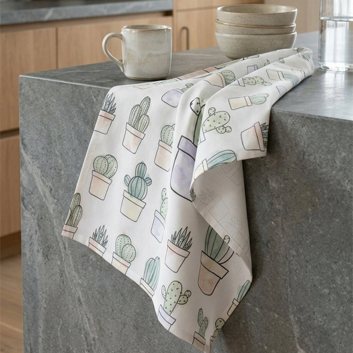 desert haze cotton kitchen towel on grey kitchen counter with crockery from Hem And Tassel 