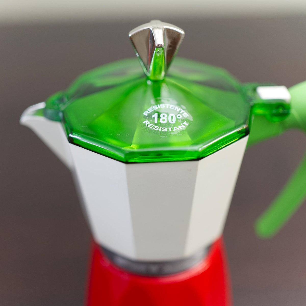 close up of heat resistant lid viva italia six-cup moka pot bearing italian flag colors - from Hem And Tassel