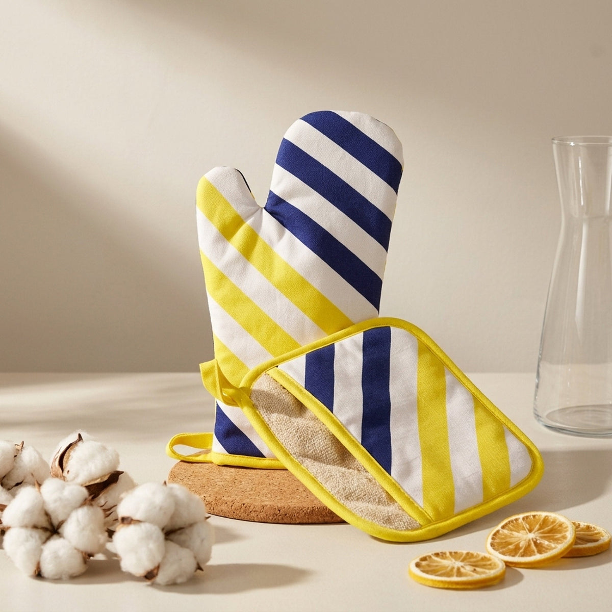 oven mitt and pot holder with a pocket for gripping, part of yellow piano collection with blue and yellow stripes from Hem And Tassel