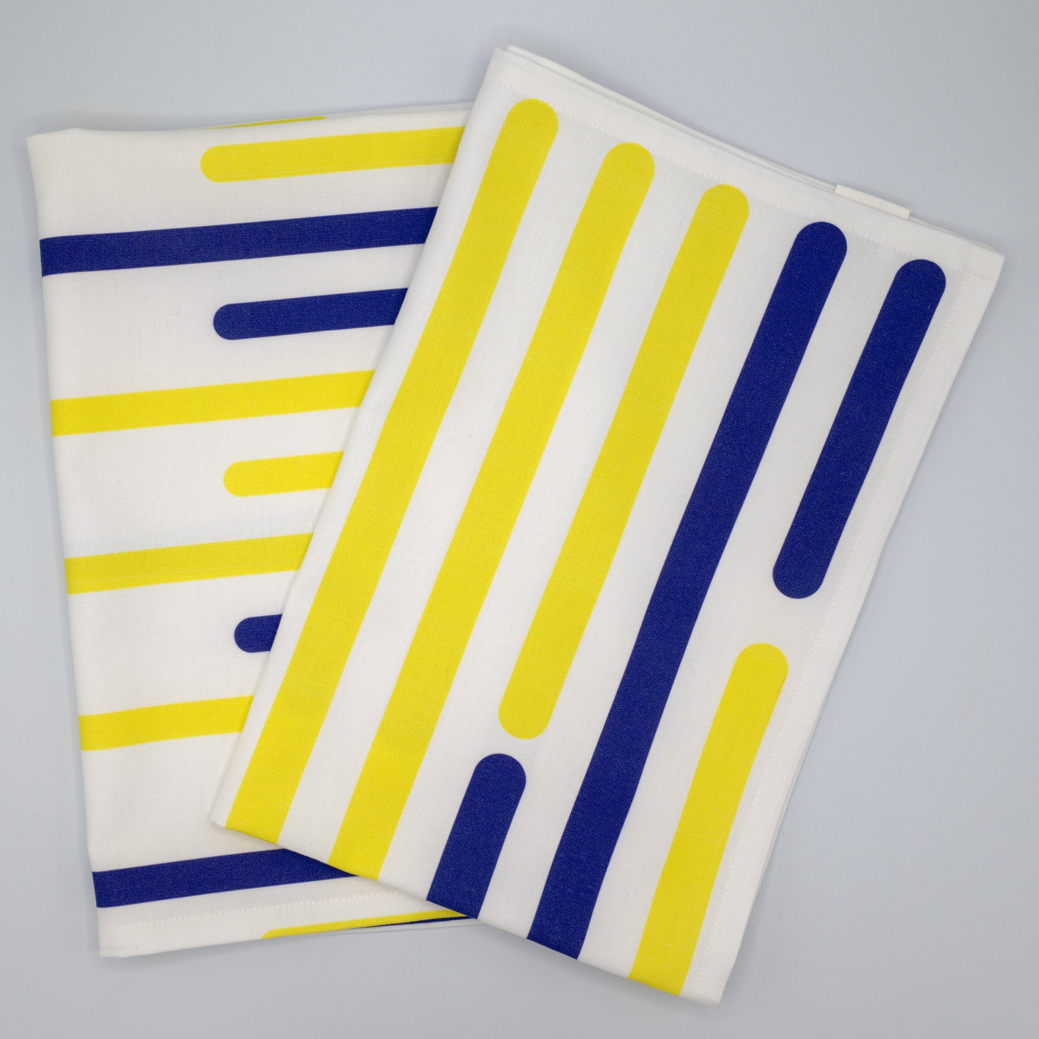 Yellow_piano_design_H_and_V_tea_towels_stacked_and_fanned from Hem And Tassel 