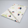 art deco lip tulip kitchen towel with a floral pattern on a gray background in oil and blush colors from Hem And Tassel 