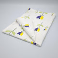 rich cotton percale kitchen towel of Lip Tulip design in yellow color on light grey background- from Hem And Tassel