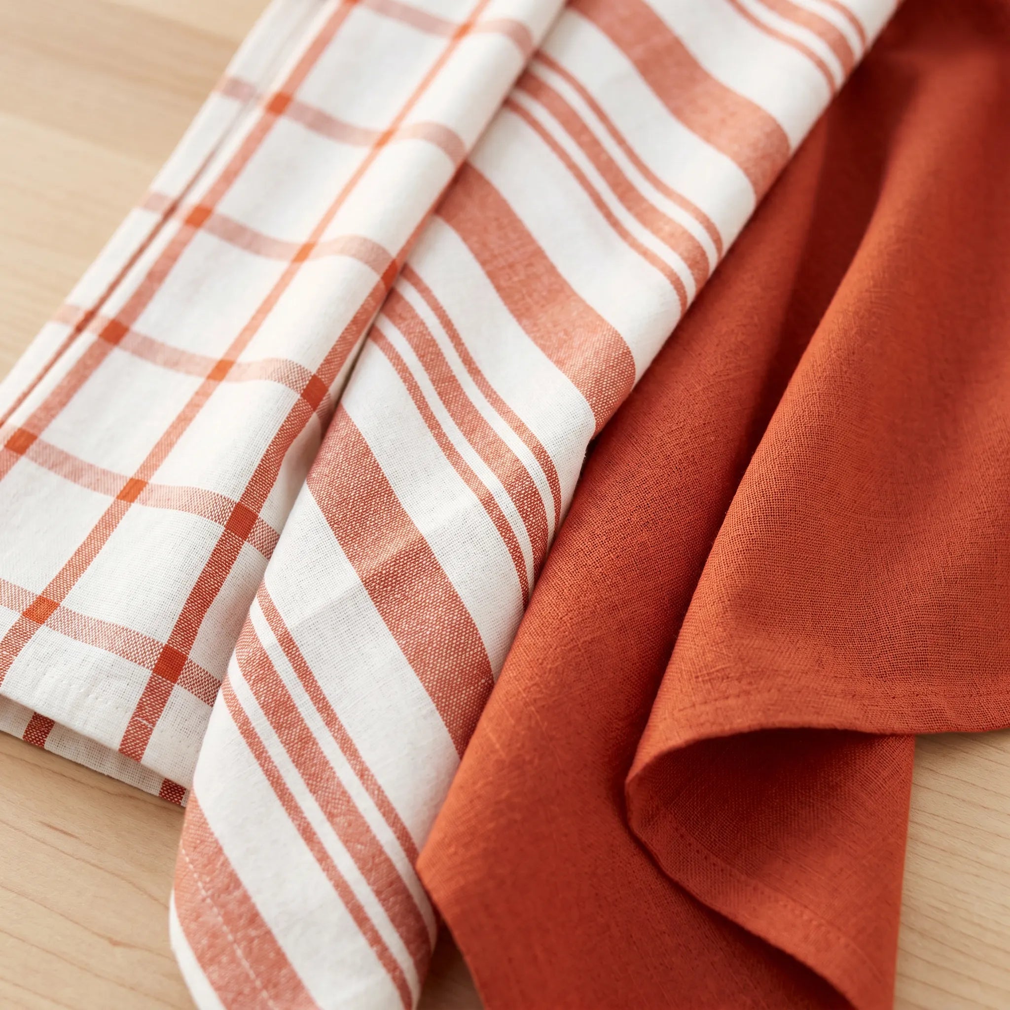 decade classics rust kitchen towels of 100% cotton - close up from Hem And Tassel