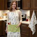 desert haze Apron on a woman in a kitchen and a desert haze kitchen towel