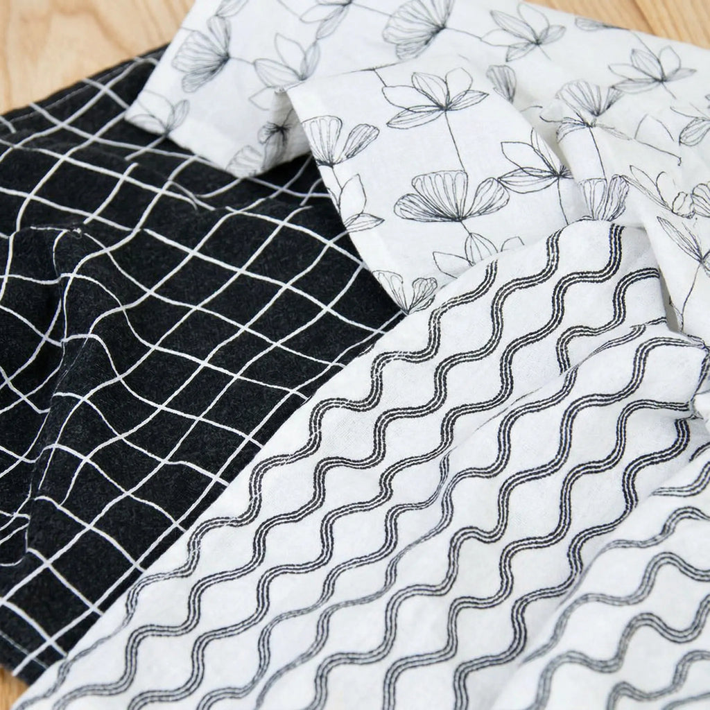 crinkled flour sack - set of three 100% cotton kitchen towels in black and white designer prints, close up from Hem And Tassel