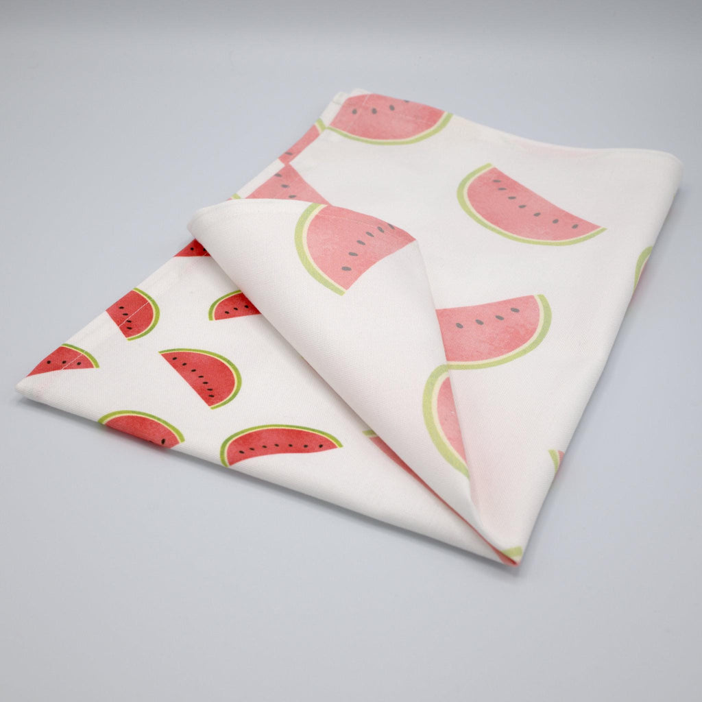 faded fruit kitchen towel folded with watermelon pattern on a gray background from Hem And Tassel 