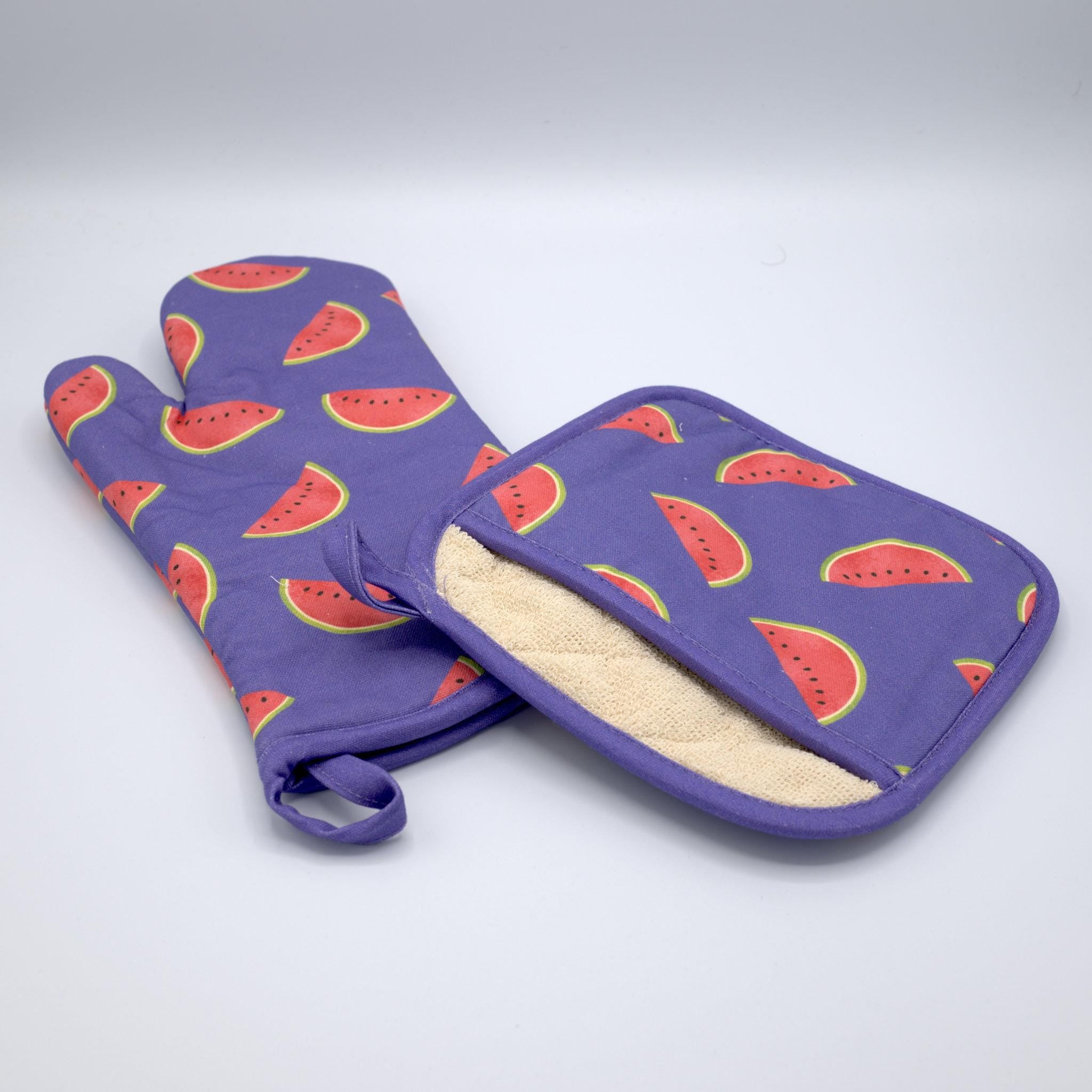 purple faded melon print oven mitt and pocketed pot holder on light grey background from Hem And Tassel