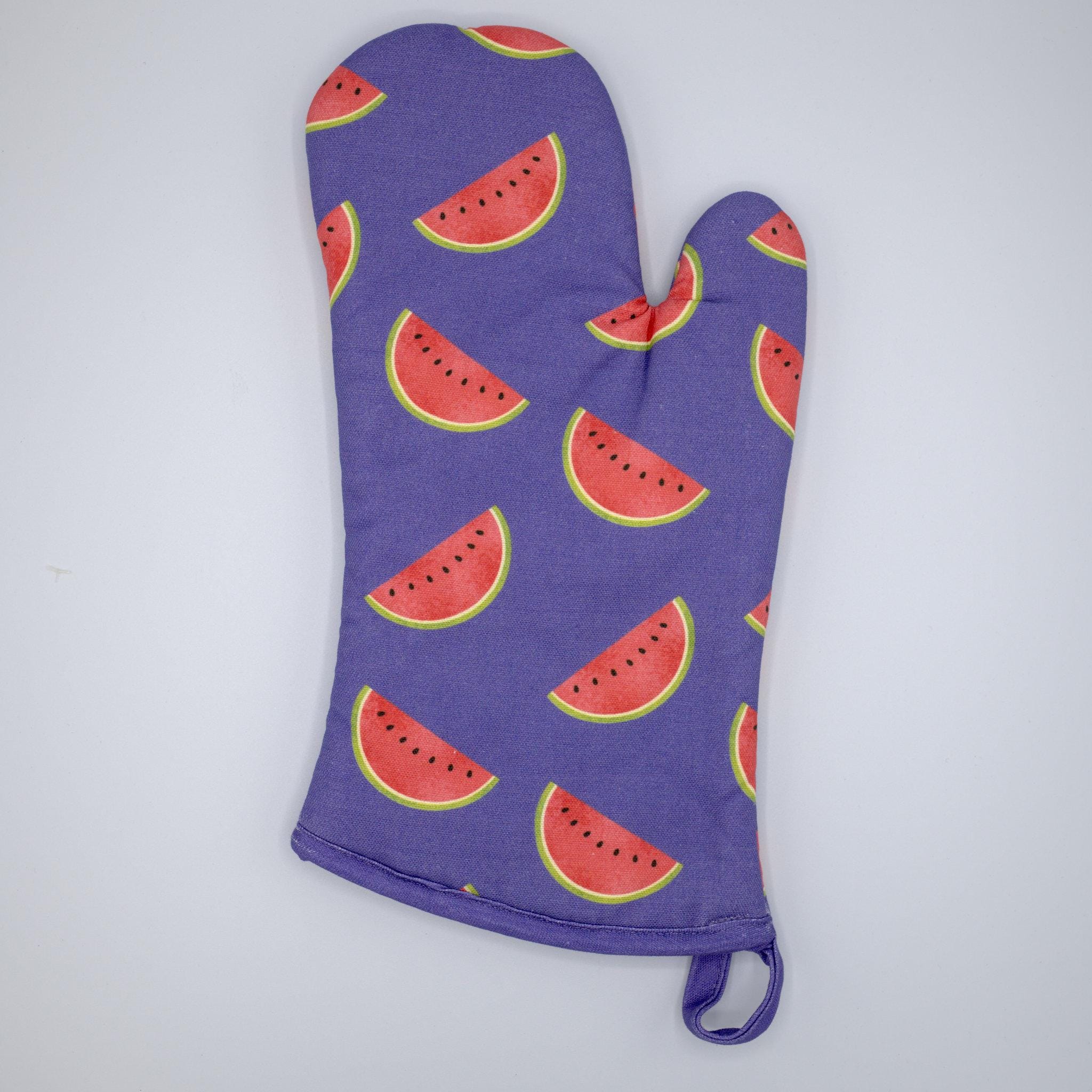 purple faded melon oven mitt on light grey background with melon print from Hem And Tassel