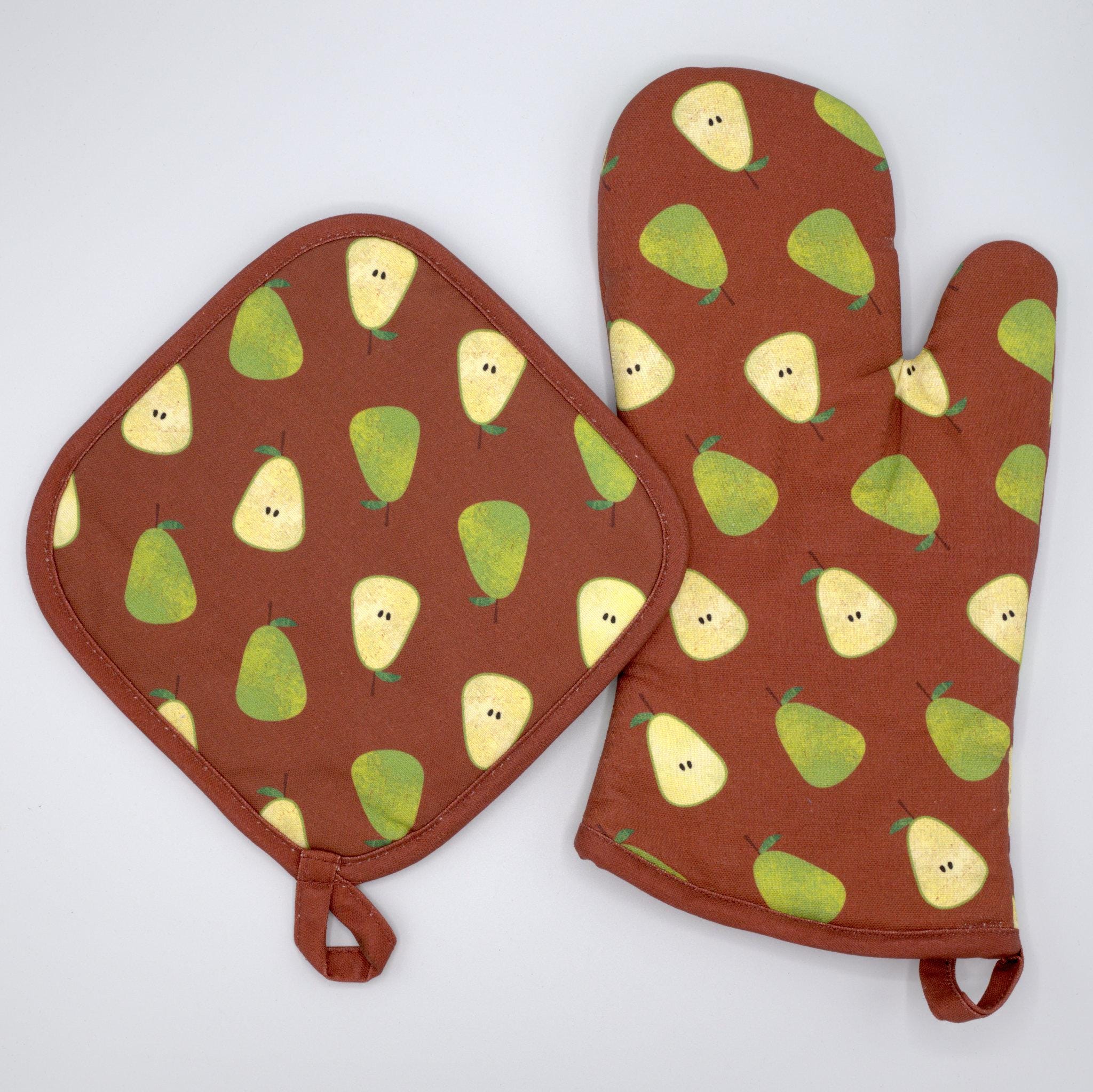 Clay oven mitt and pot holder with faded pear pattern from Hem And Tassel  on a white background