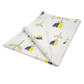 Hem And Tassel kitchen towel in white cotton with a geometric Art Deco tulip print in yellow and purple.