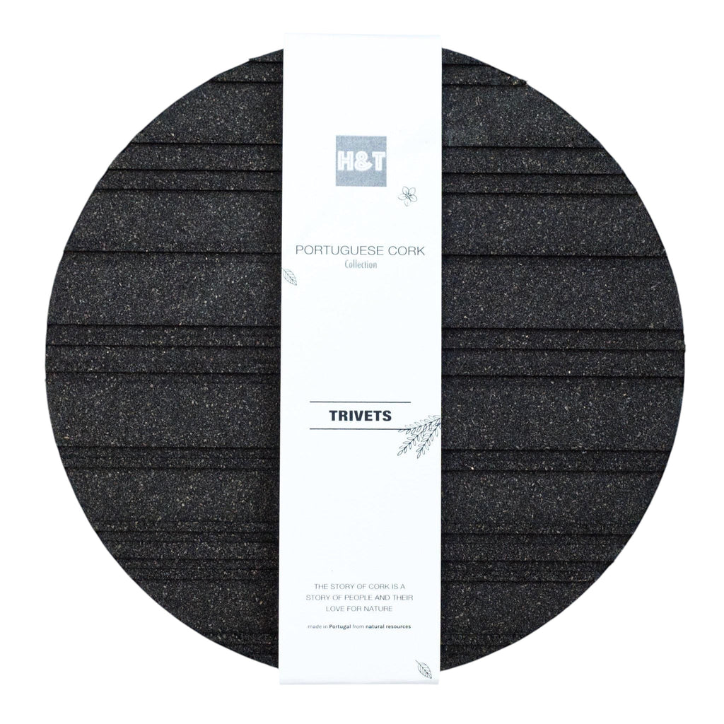 Hem And Tassel round black cork trivet with grooved heat-dissipating pattern and branded paper wrap