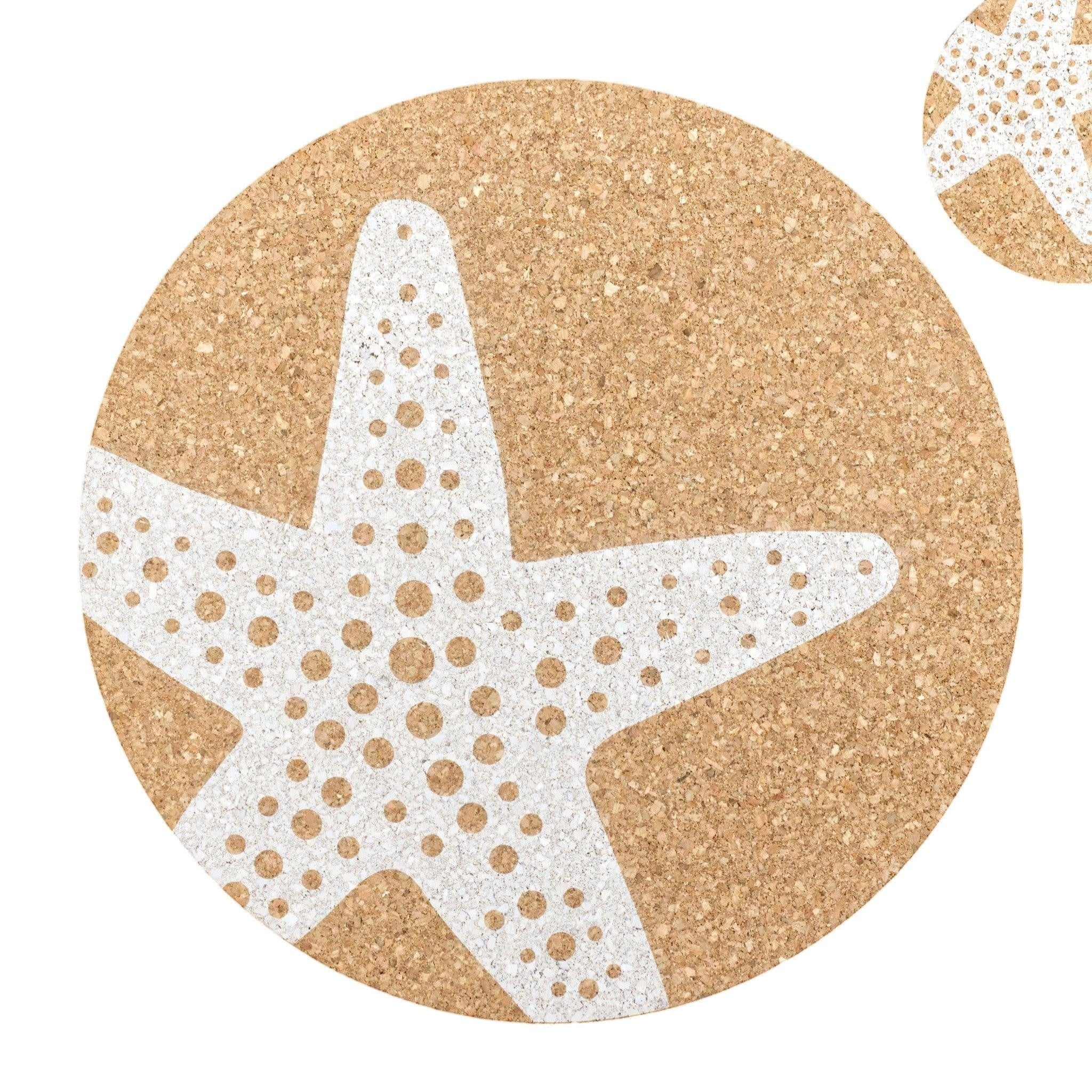 Hem And Tassel round natural cork placemat featuring a white starfish marine print, sustainable coastal table decor.