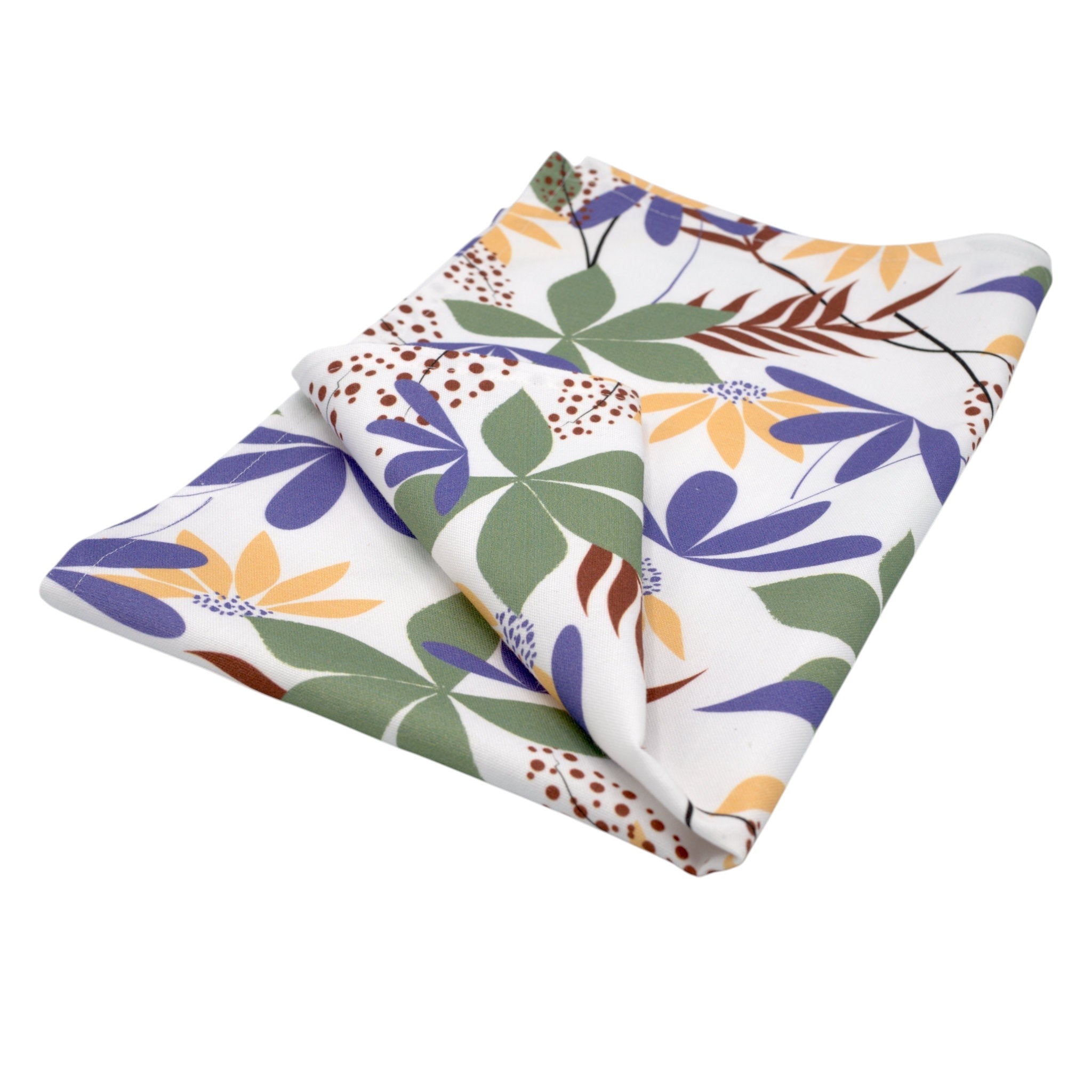 Hem And Tassel cotton kitchen towel featuring a colorful floral print with yellow, purple, and green botanical motifs.