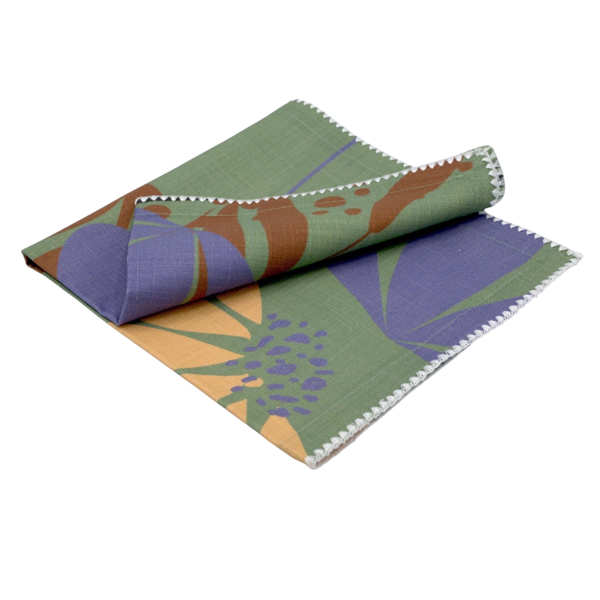 Hem And Tassel floral dinner napkin in green and purple slub cotton with a textured finish and decorative edge
