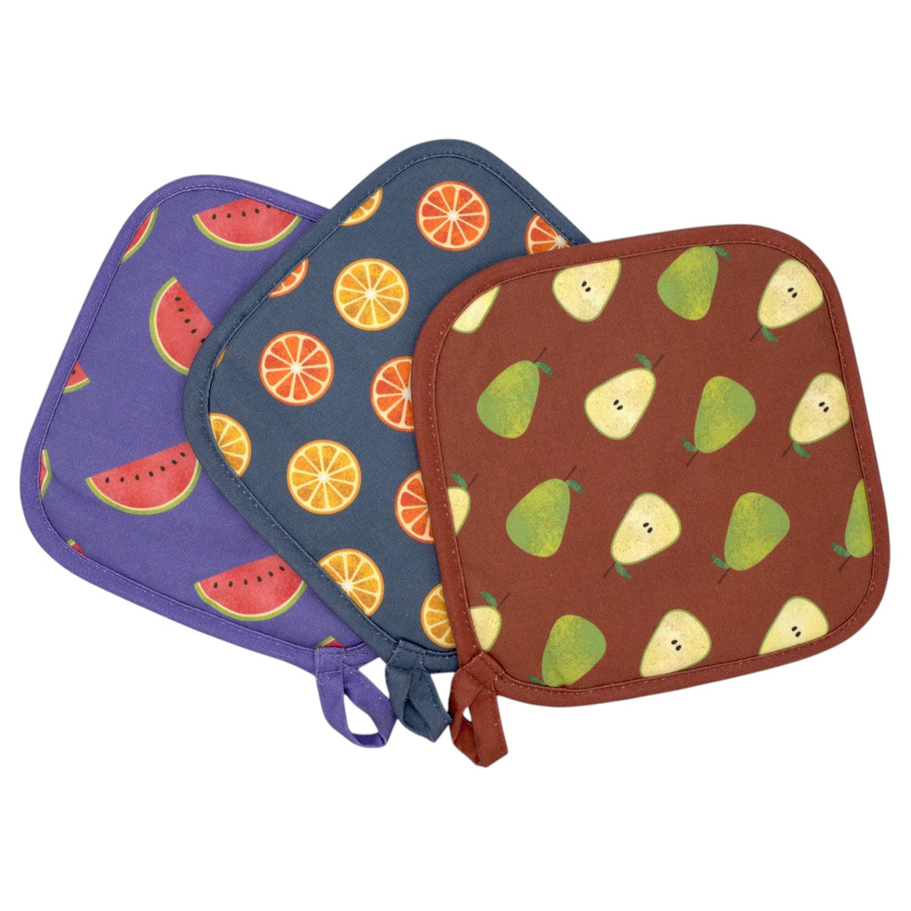 Hem And Tassel cotton pot holders featuring watermelon, orange, and pear fruit patterns with quilted insulation.