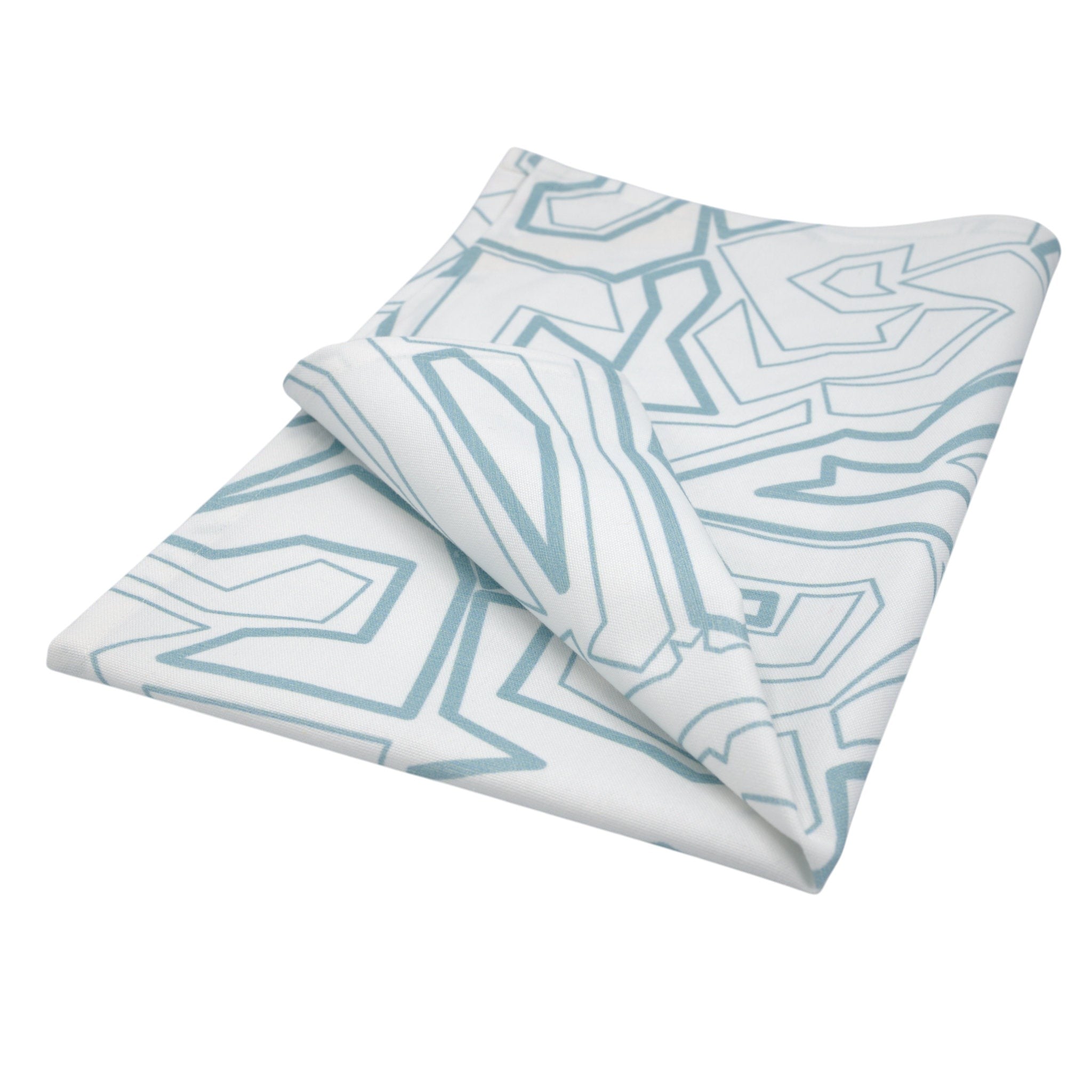 Hem And Tassel cotton kitchen towel with a modern blue and white geometric squiggles pattern on high-count fabric.