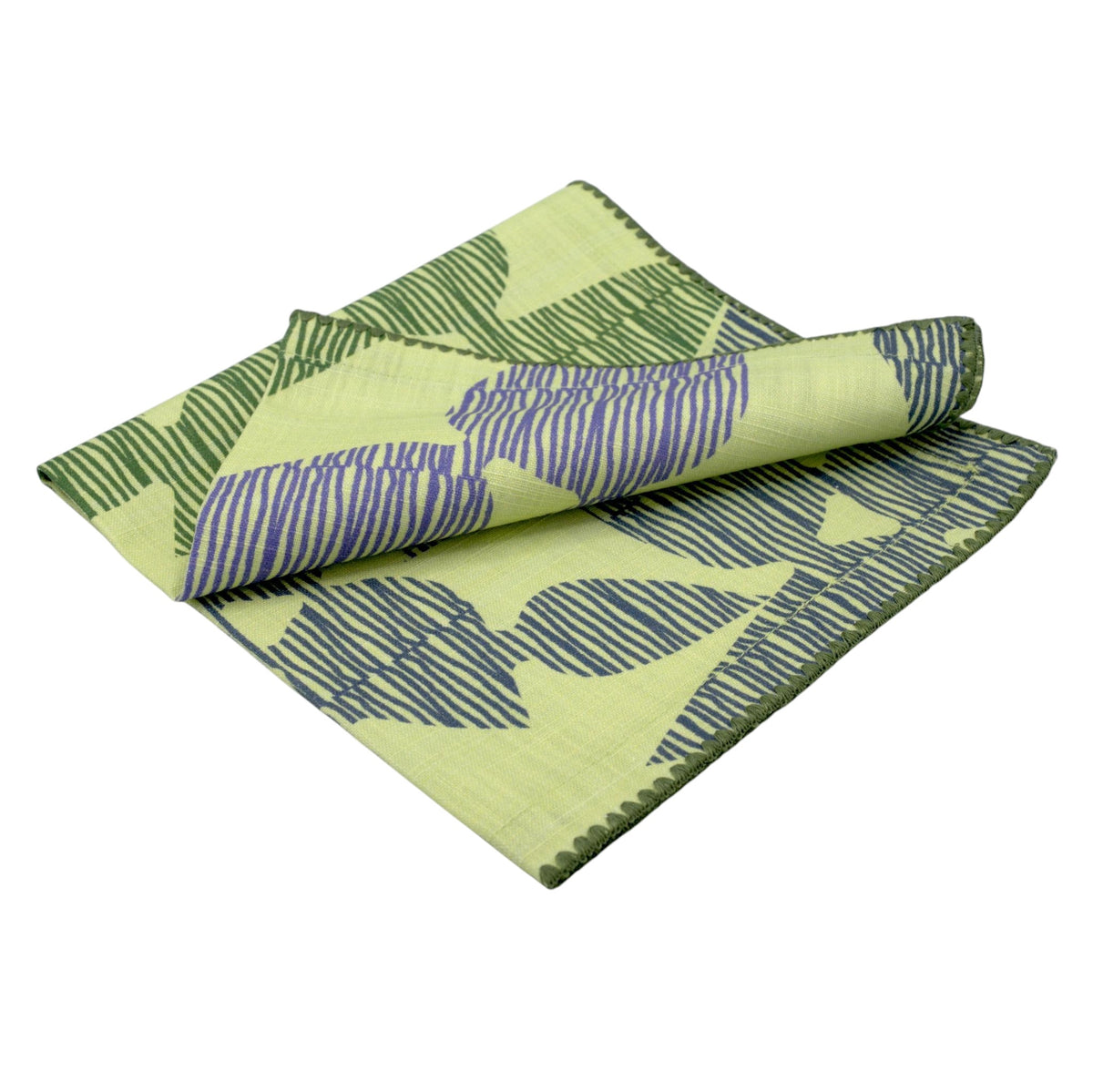 Hem And Tassel Celebration slub cotton dinner napkin in lime green with purple leaf print and stitched edges.