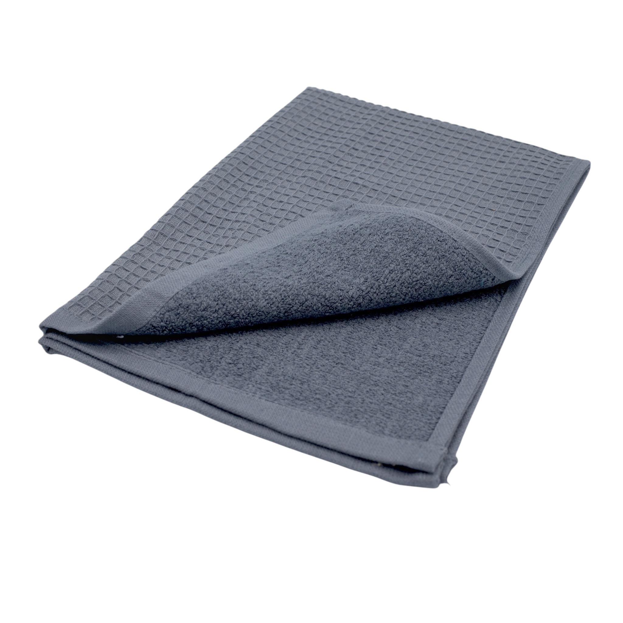 Hem And Tassel grey reversible kitchen towel featuring a ribbed waffle texture on one side and soft terry on the other