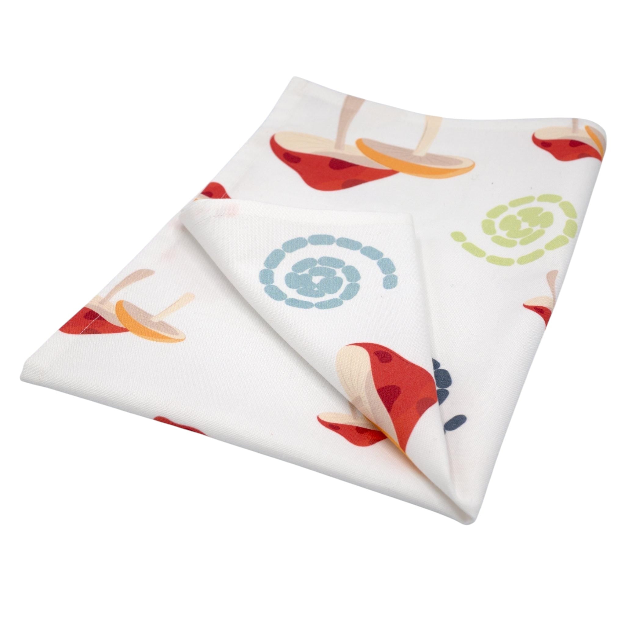 Hem And Tassel cotton kitchen towel with a retro mushroom and swirl print on an optic white background.