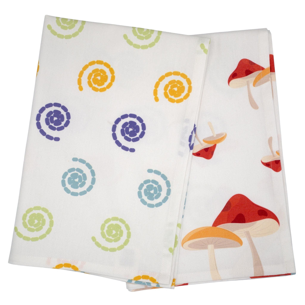 Hem And Tassel cotton kitchen towels featuring retro mushroom and colorful swirl prints on white fabric