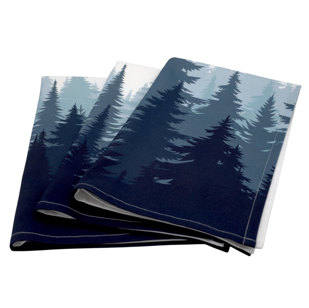 Hem And Tassel set of three cotton kitchen towels featuring an ombré pine forest print in shades of dark blue