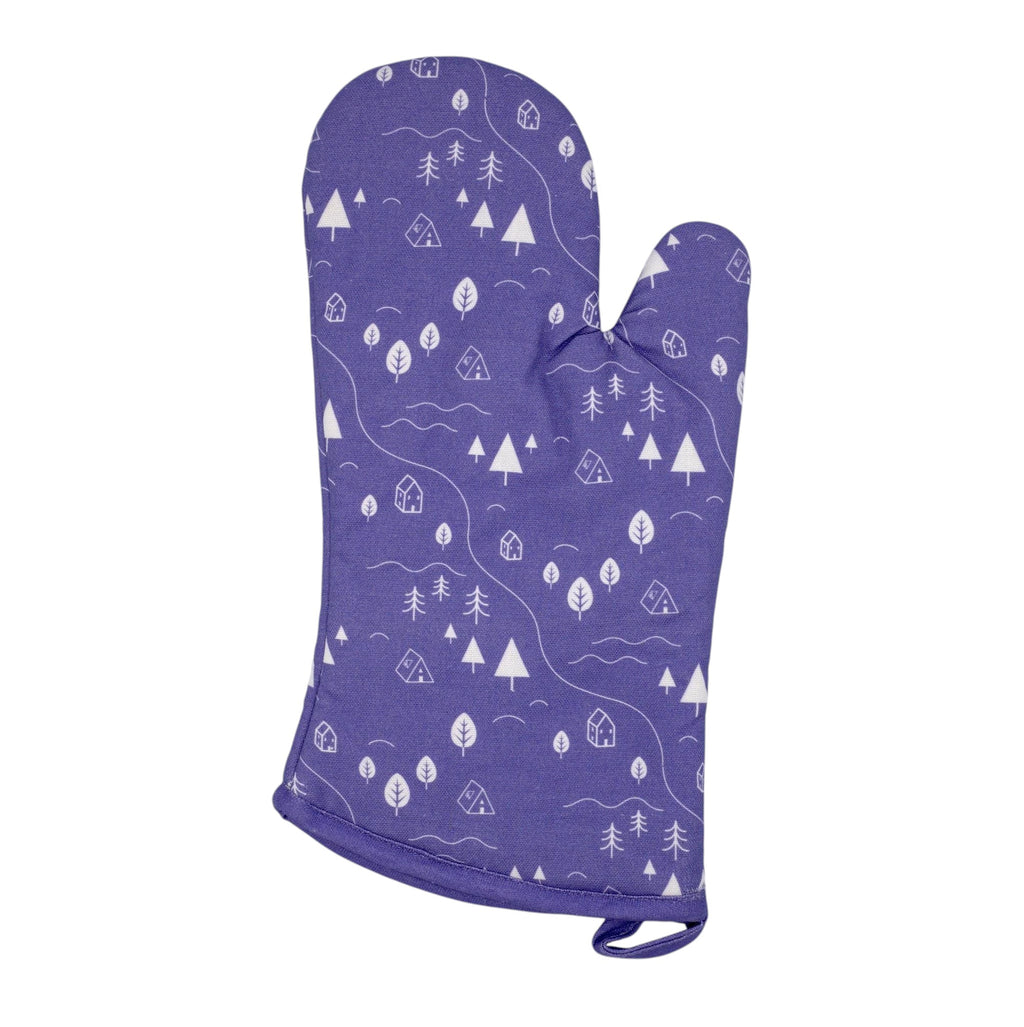 Hem And Tassel purple cotton oven mitt featuring a white countryside camping motif with trees and tiny tents.