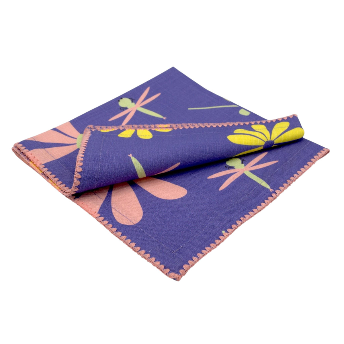 Hem And Tassel purple slub cotton dinner napkin with a playful dragonfly and floral pattern and pink stitched edges