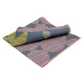 Hem And Tassel Celebration slub cotton dinner napkin with grey, pink, and yellow abstract confetti pattern