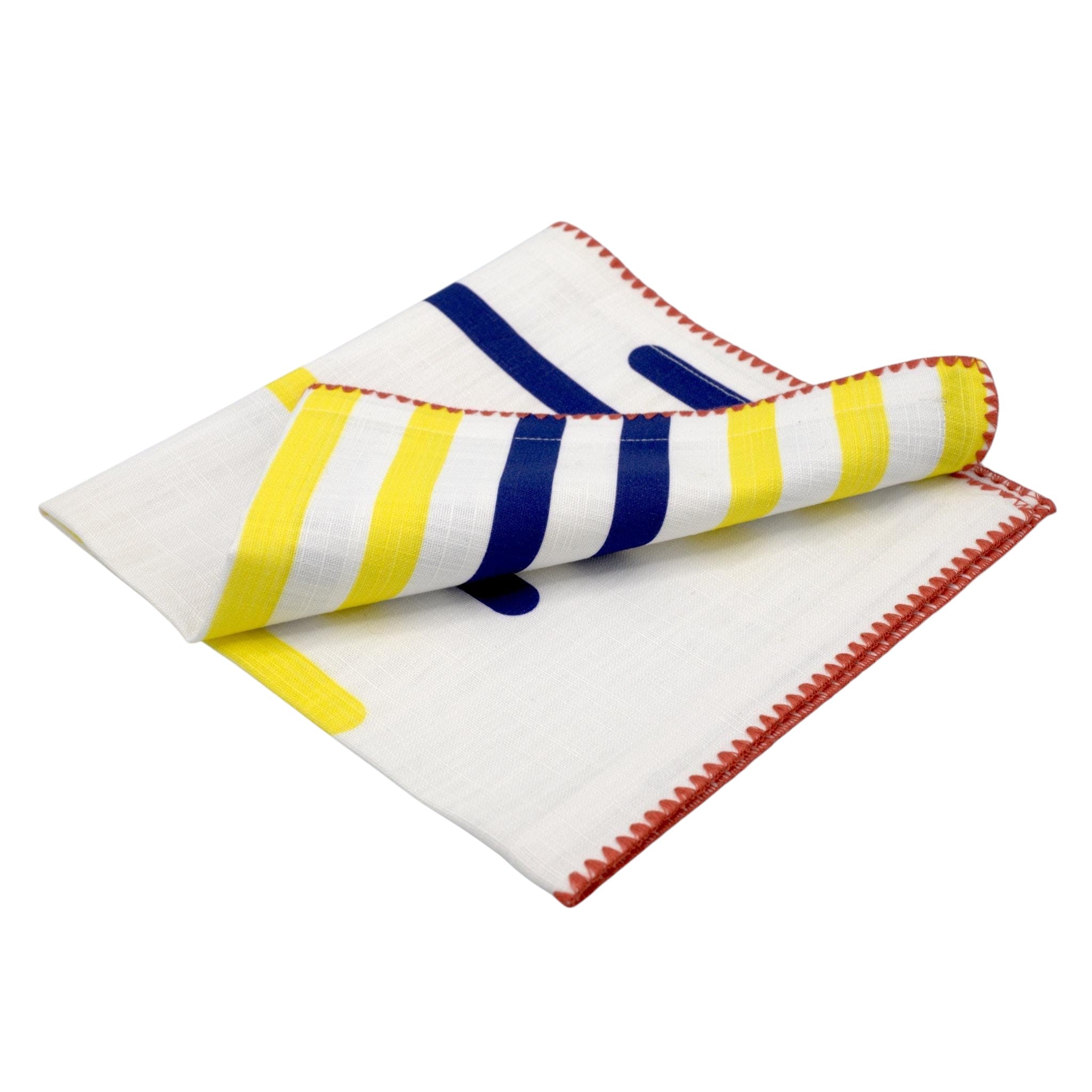 Hem And Tassel yellow and blue piano key striped dinner napkin in double-slub cotton with red edge detailing.