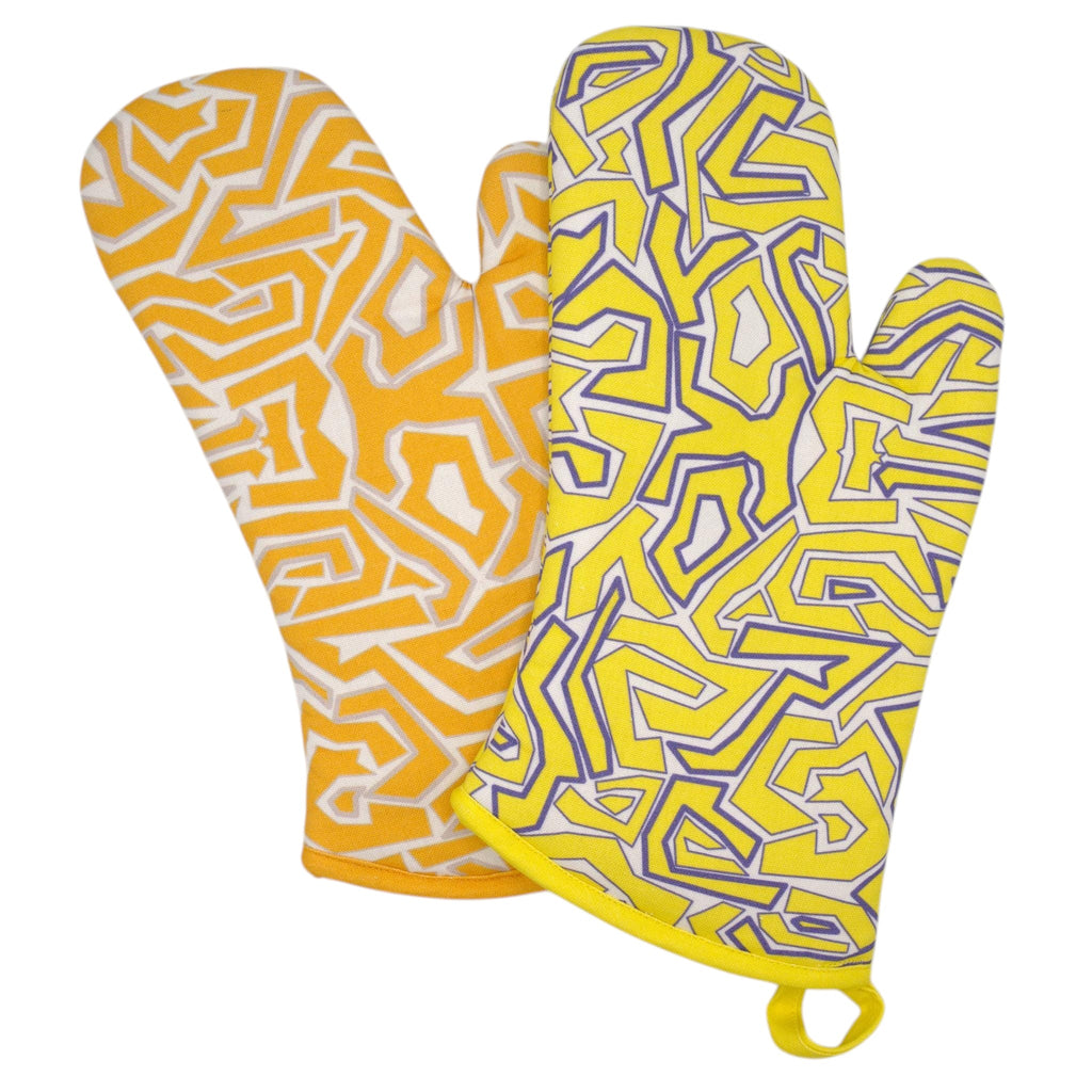 Hem And Tassel oven mitts in yellow and white maze pattern made from durable quilted cotton for kitchen use