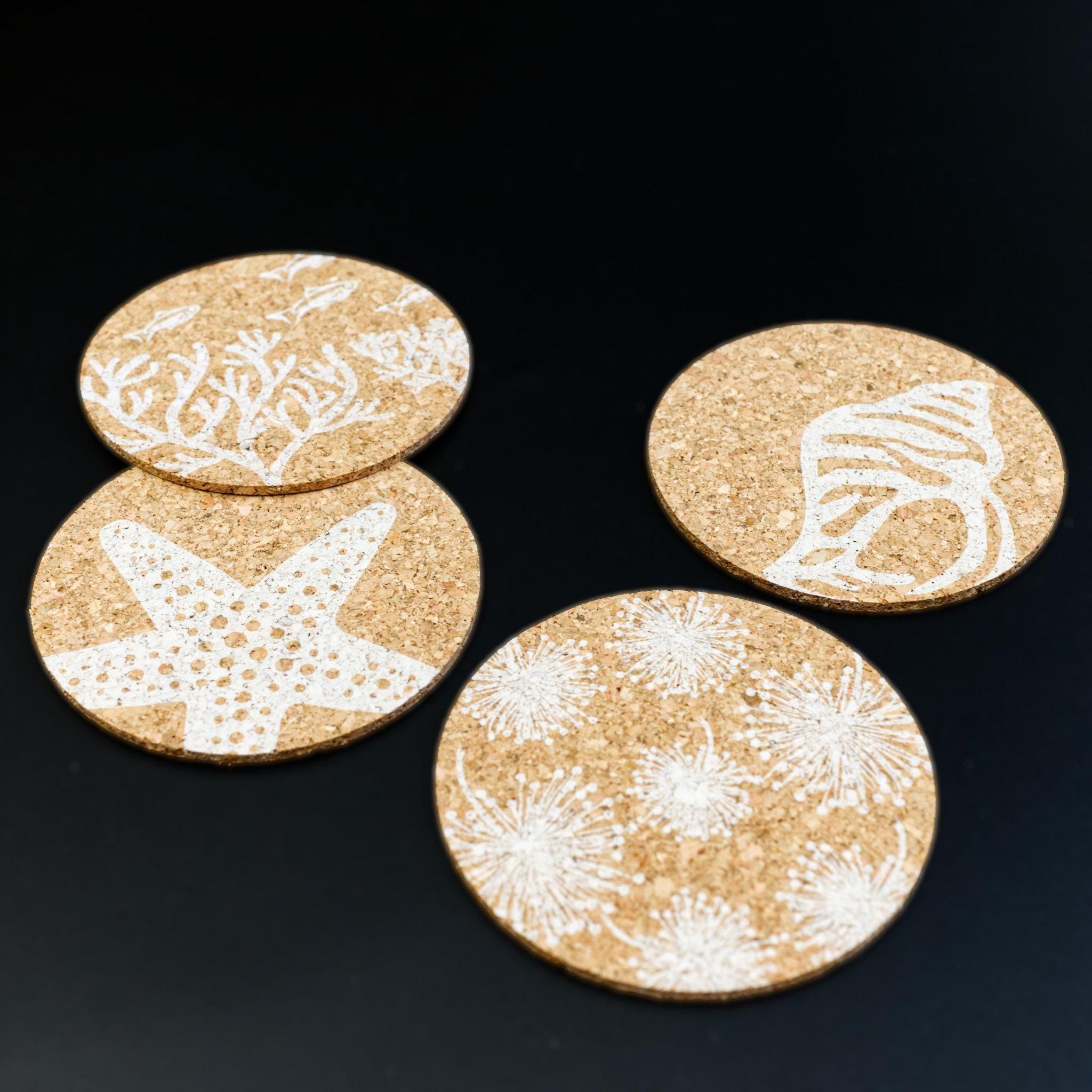 home by the sea cork coasters from Hem And Tassel on black background