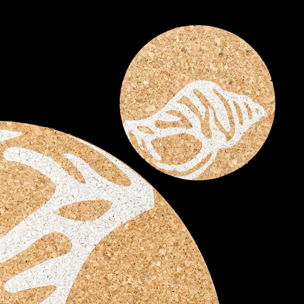 home by the sea cork coaster and matching placemat from Hem And Tassel on black background