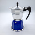 Blue and silver induction moka pot coffee maker with black handle on a light gray background from Hem And Tassel 