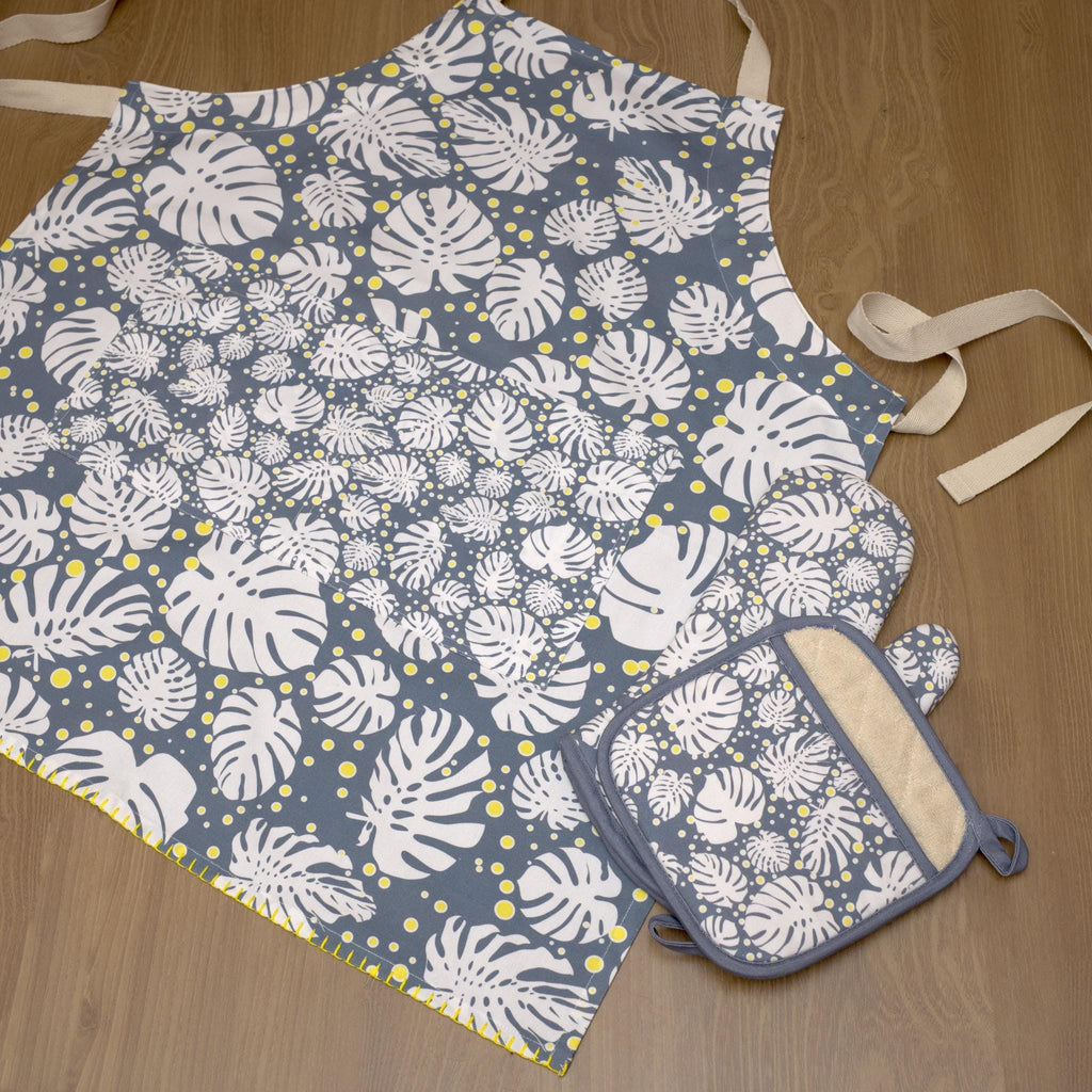 rich cotton oven mitt and pot holder in winter color, with matching apron in monster-ah design - from Hem And Tassel