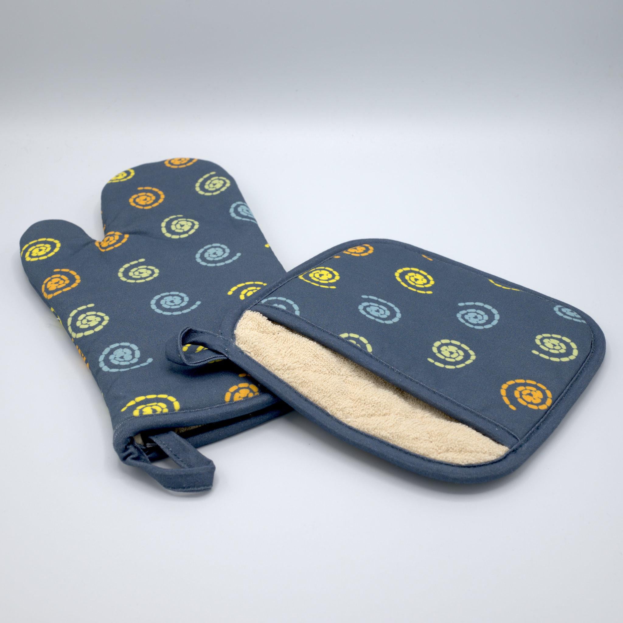 mushroom magic cotton oven mitt and pocketed pot holder from Hem And Tassel, on a light grey surface