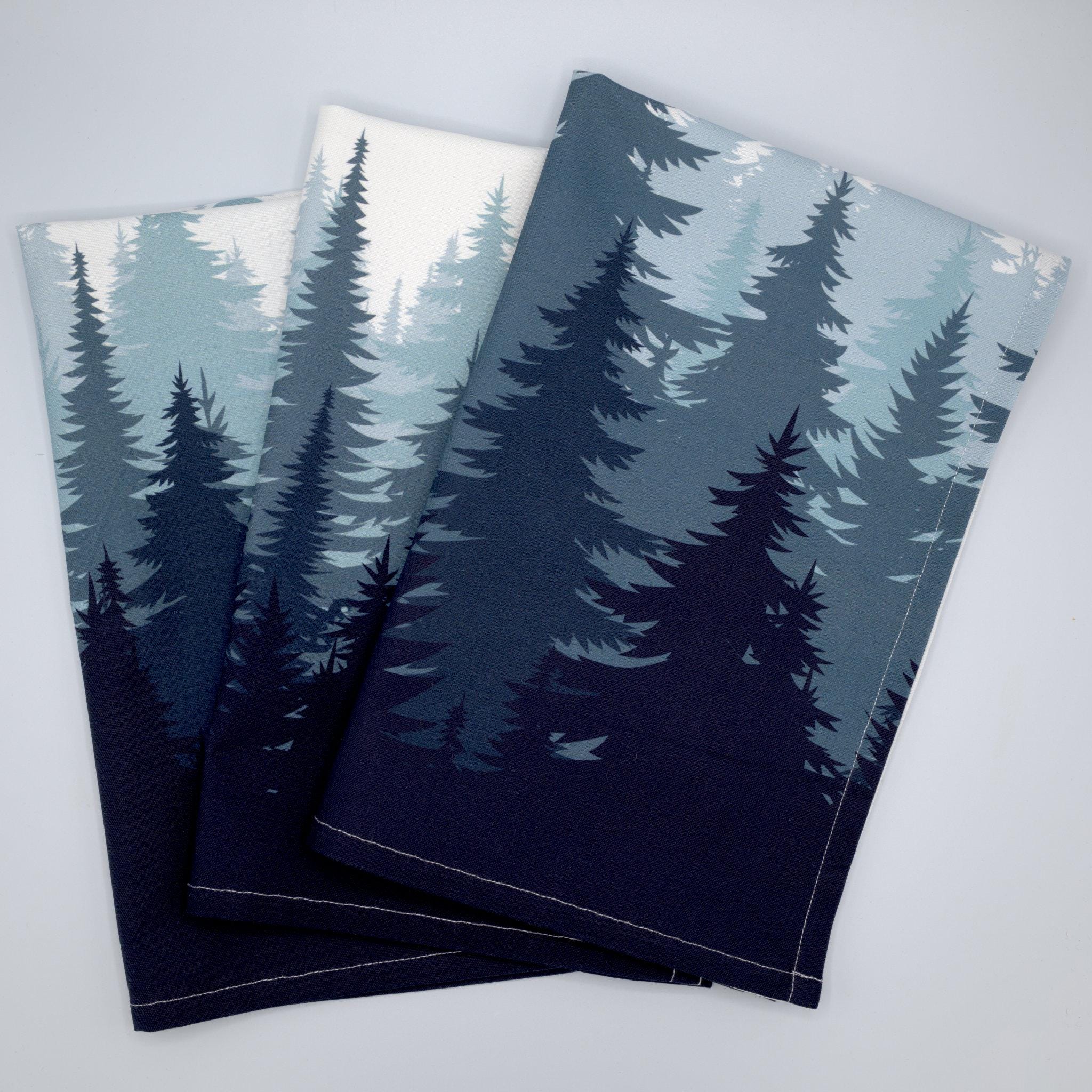 Two pine forest kitchen towels set with forest design on a white background from Hem And Tassel 
