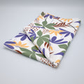 Fall colors in pollen up design tea towels folded on a light gray backdrop