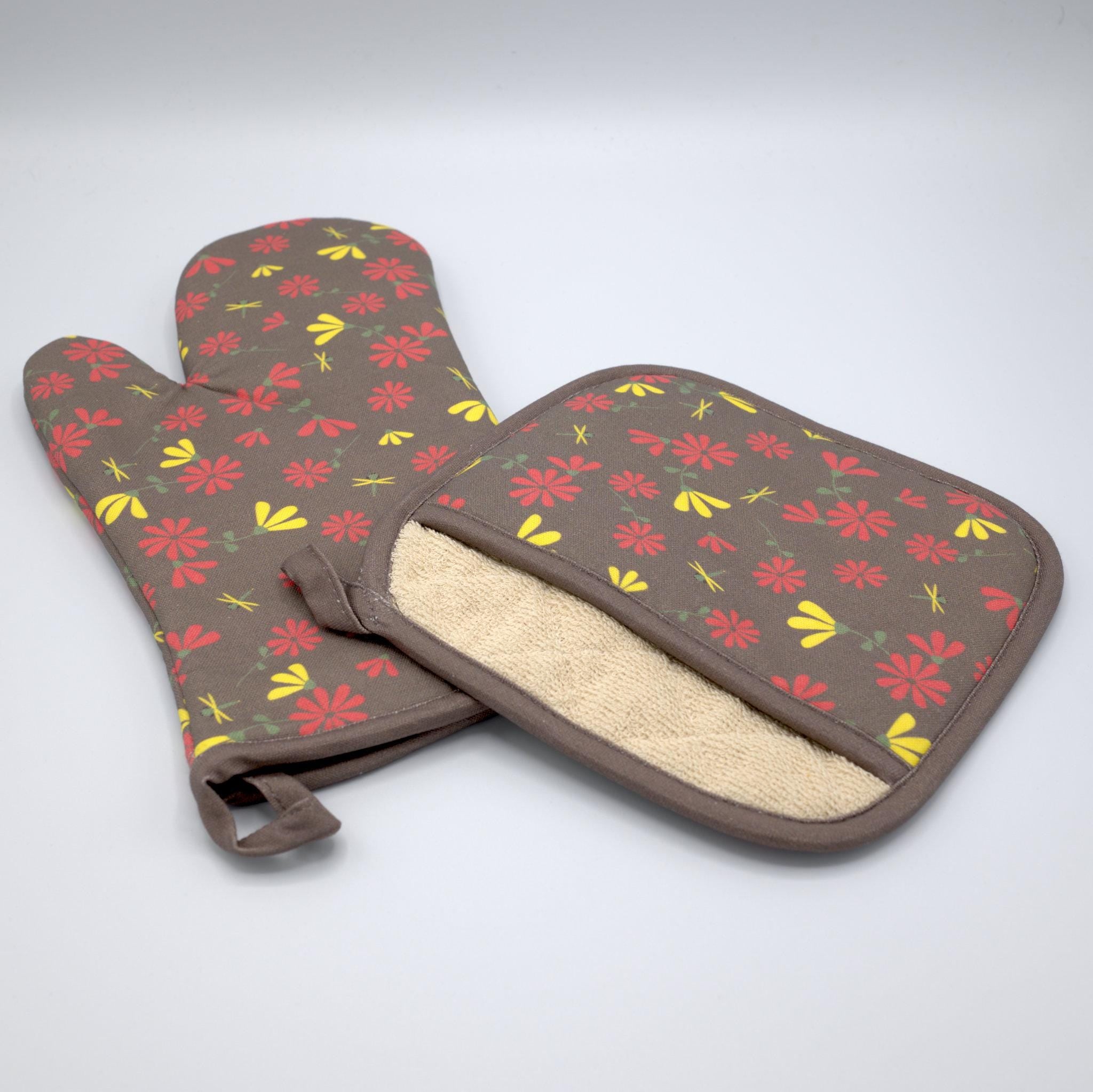 Floral patterned shy dragonfly oven mitt and pot holder on a gray background from Hem And Tassel 