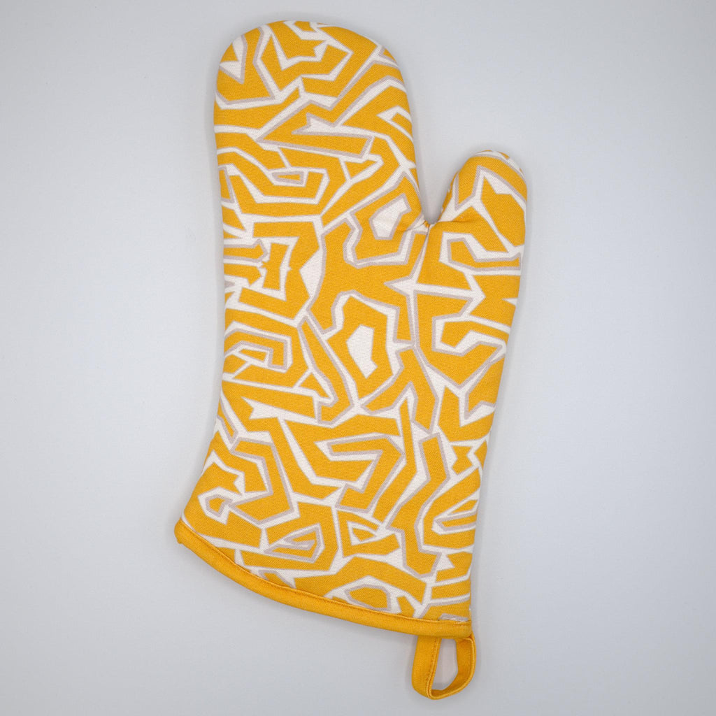 squggles  orange and white patterned oven mitt on a light gray background from Hem And Tassel 