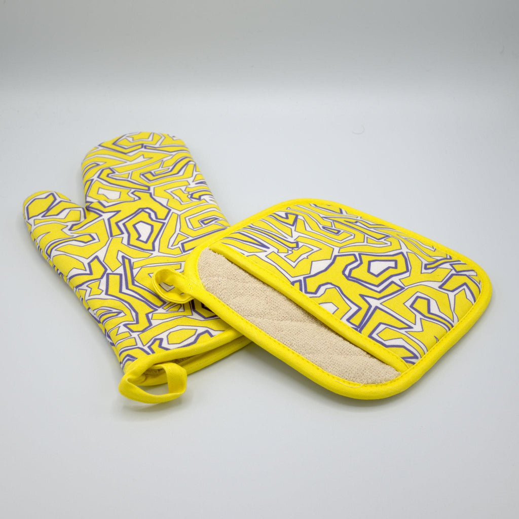 Yellow and purple squggles  patterned oven mitt and pot holder on a light gray background
