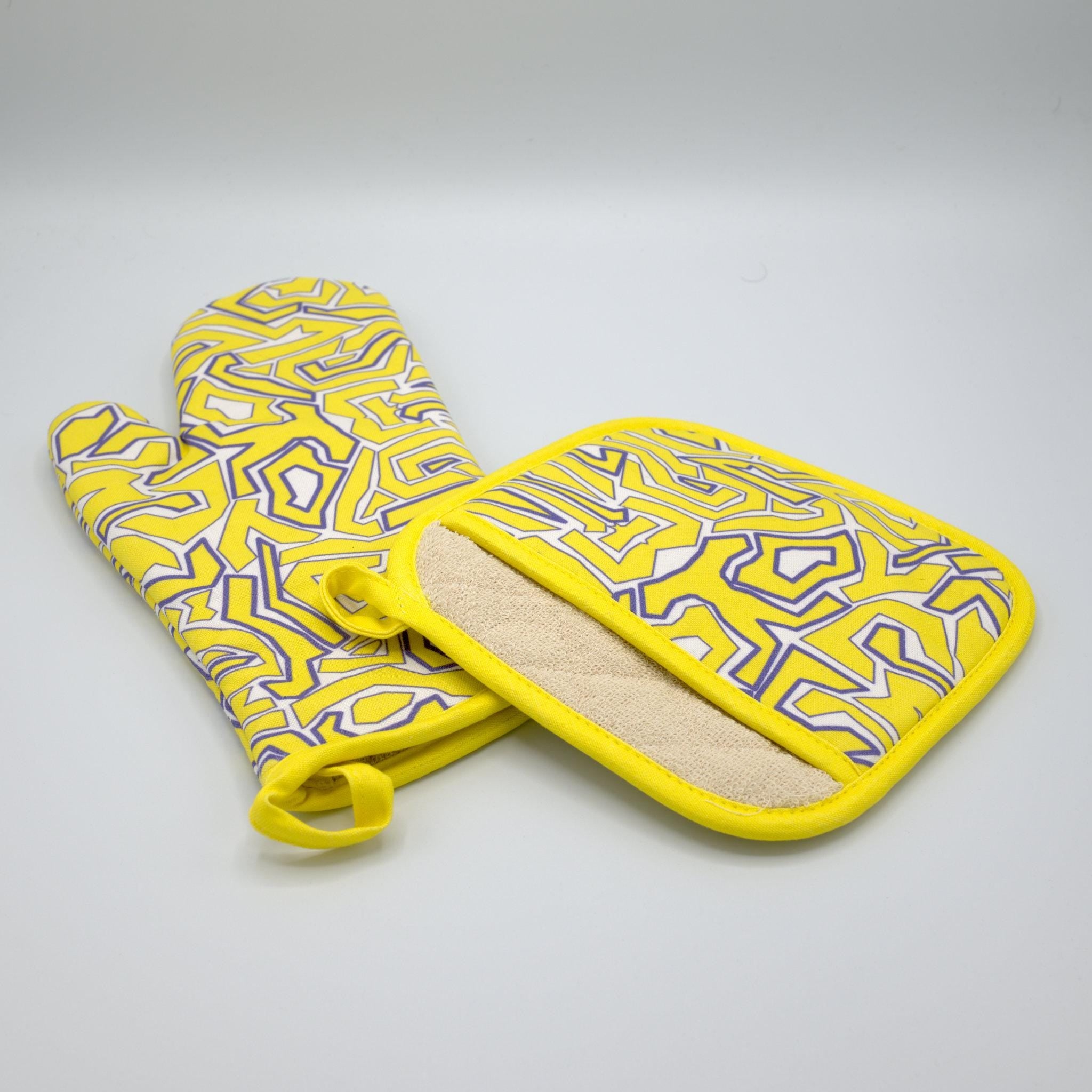 Yellow and purple squggles  patterned oven mitt and pot holder on a light gray background