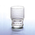 Clear stackable glass tumbler with textured design made in Japan, from Hem And Tassel on a light gray background